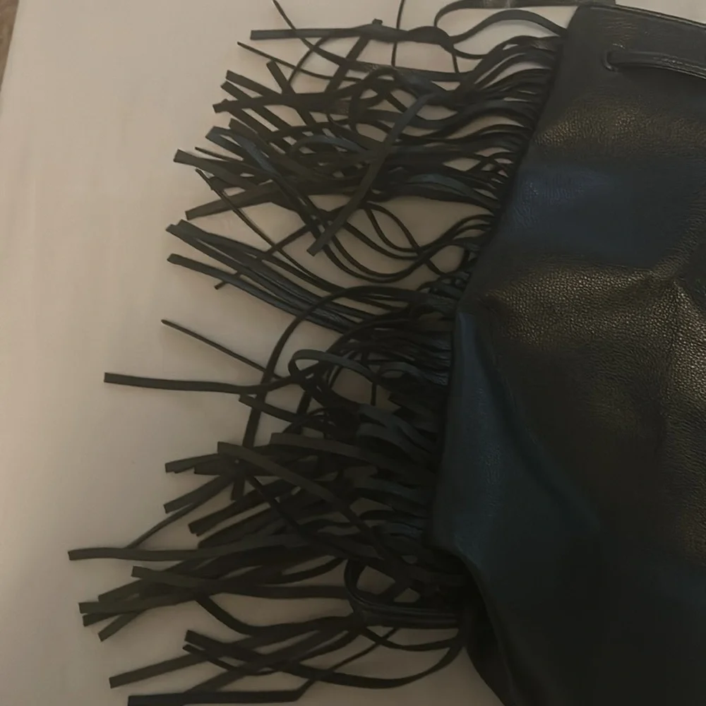Victoria secret leather with fringe on side backpack